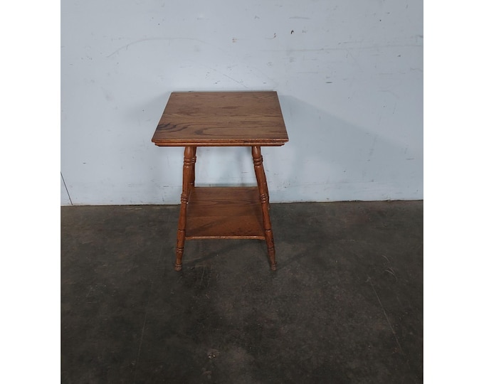1920,s Two Tier Oak Parlour Table # 195322 Shipping is not a 1.00 Shipping is not free please contact us before purchase Thanks
