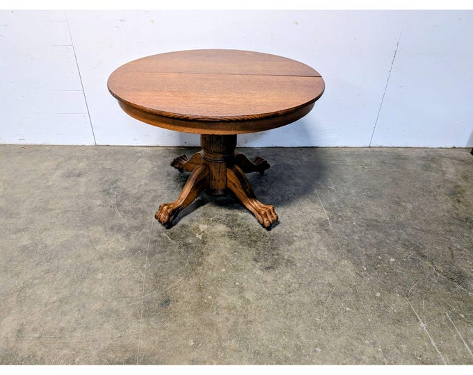 1920,s Round Oak Table With Claw Feet # 201090 Shipping is not a 1.00 Shipping is not free please contact us before purchase Thanks