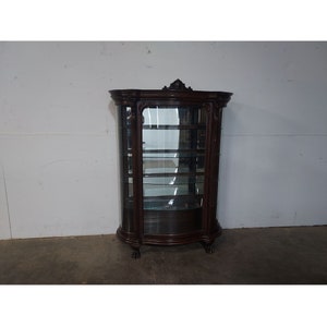 1880,s Dark Oak Curved Glass Cabinet # 192740 Shipping is not a 1.00 Shipping is not free please contact us before purchase Thanks
