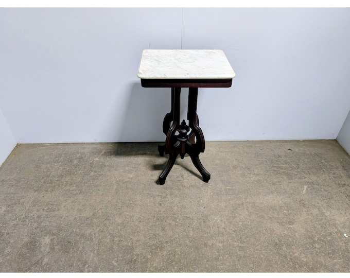 1860,s Mahogany Table With A  Marble Top # 201077 Shipping is not a 1.00 Shipping is not free please contact us before purchase Thanks