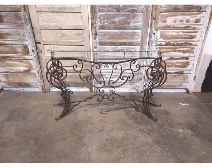 1940,S Cast Iron Console With Glass Top # 186970 Shipping is not a 1.00 Shipping is not free please contact us before purchase Thanks