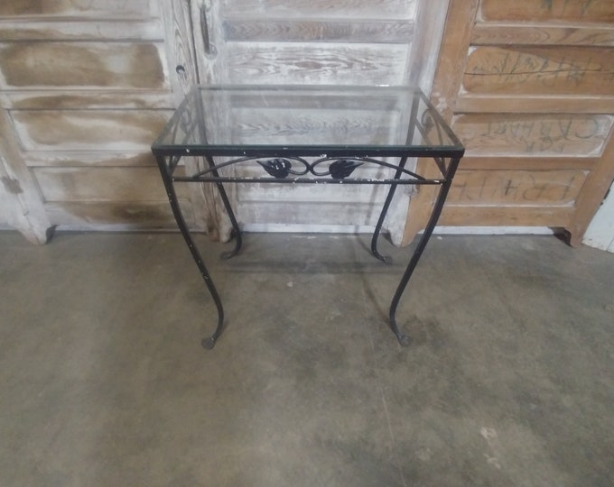 1920'S IRON & GLASS TABLE # 184544 Shipping is not a 1.00 Shipping is not free please contact us before purchase Thanks