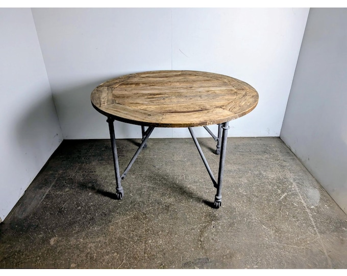 Round Natural Oak Table On A Metal Base # 198032 Shipping is not a 1.00 Shipping is not free please contact us before purchase Thanks