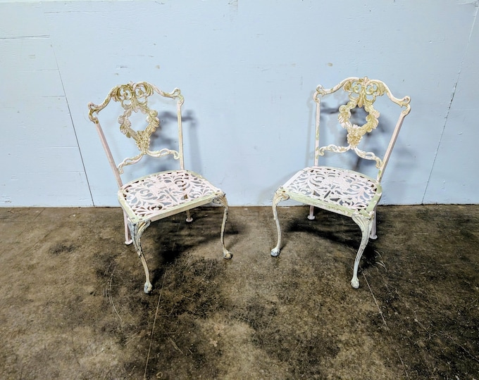 Pair Of Elegant 1950,s Cast Chairs # 201132 Shipping is not a 1.00 Shipping is not free please contact us before purchase Thanks