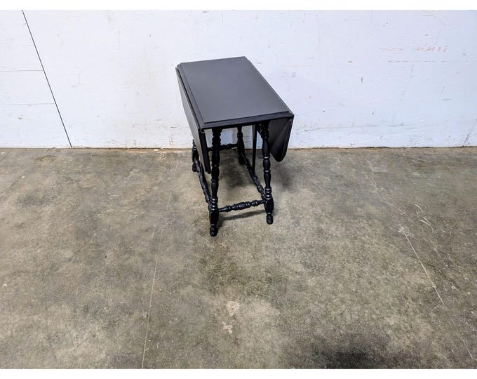 1940,s Black Painted Drop Leaf Table # 198560 Shipping is not a 1.00 Shipping is not free please contact us before purchase Thanks