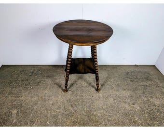1920,s Two Tier Oak Table # 197765 Shipping is not a 1.00 Shipping is not free please contact us before purchase Thanks