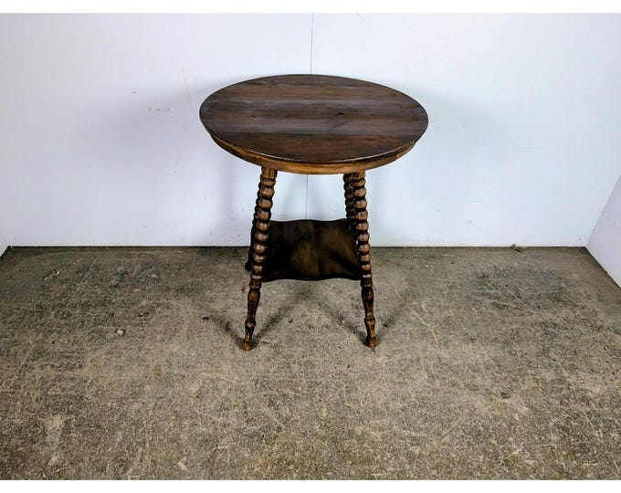 1920,s Two Tier Oak Table # 197765 Shipping is not a 1.00 Shipping is not free please contact us before purchase Thanks
