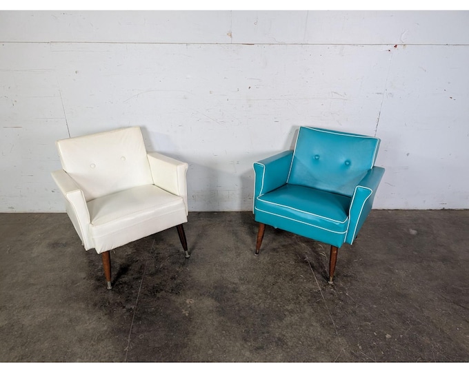 Pair Of 1950,s Mismatched Color Leather Arm Chairs # 197417 Shipping is not a 1.00 Shipping is not free please contact us before purchase
