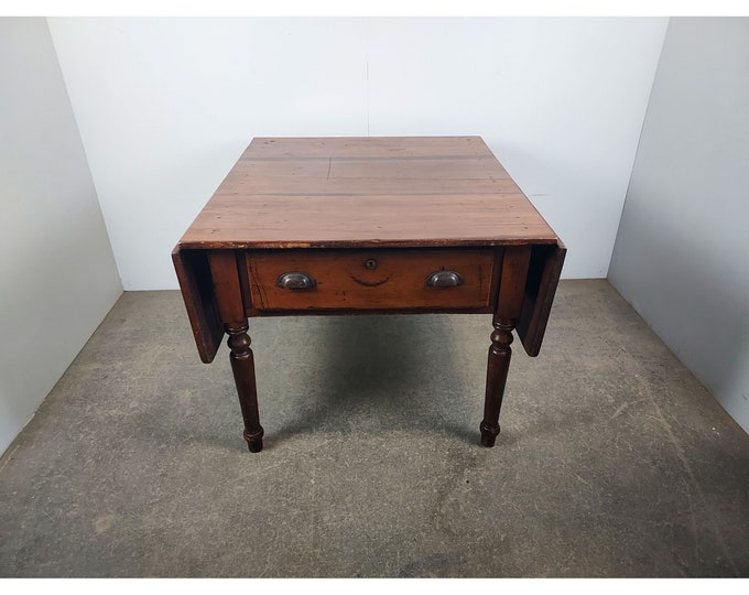 Unique Two Drawer Drop Leaf Table # 189798 Shipping is not a 1.00 Shipping is not free please contact us before purchase Thanks