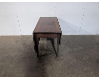 Unusual Walnut Drop Leaf Table # 197749 Shipping is not a 1.00 Shipping is not free please contact us before purchase Thanks