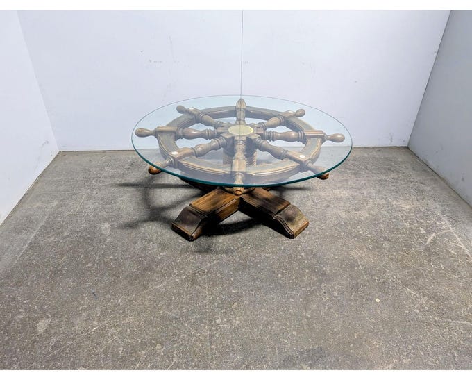 1940,s Glass Top Ship Wheel Table # 198308 Shipping is not a 1.00 Shipping is not free please contact us before purchase Thanks