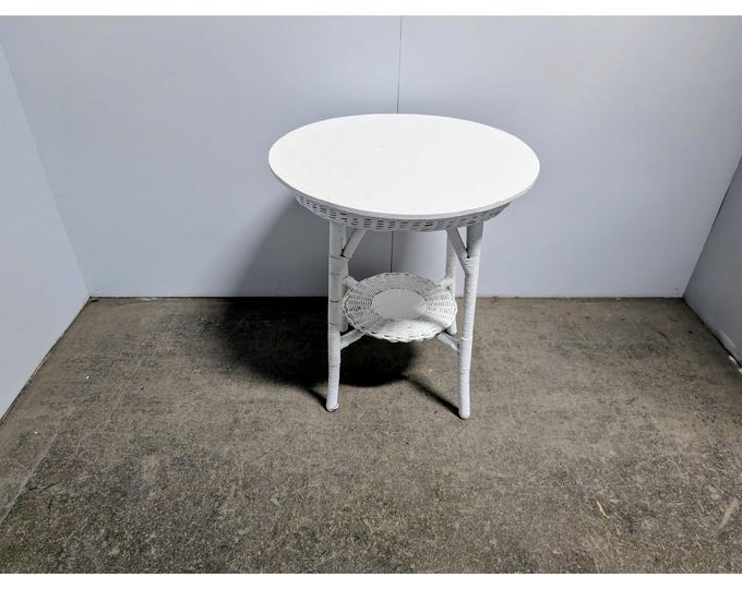 1940,S  ROUND WICKER TABLE # 199679 Shipping is not a 1.00 Shipping is not free please contact us before purchase Thanks