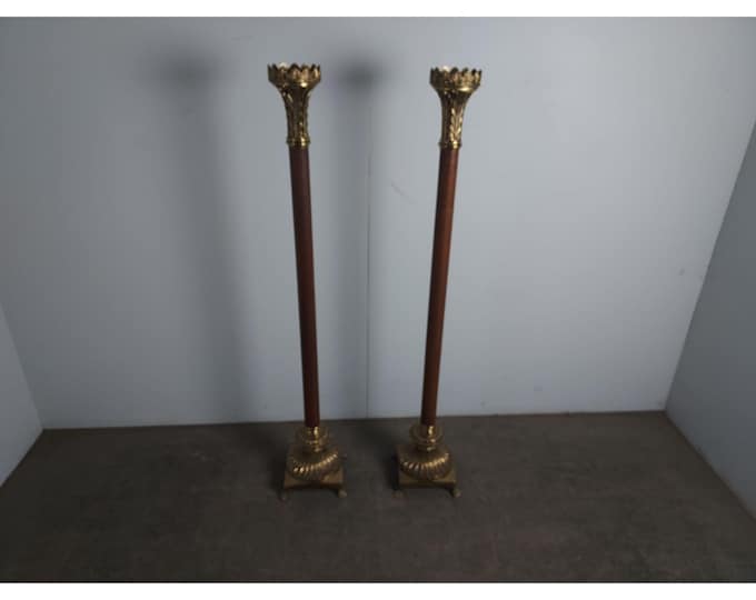 Pair Of Tall Brass And Leather Candle Sticks # 195274 Shipping is not a 1.00 Shipping is not free please contact us before purchase Thanks