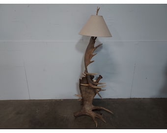 An Outstanding Elk Floor Lamp # 189807 Shipping is not a 1.00 Shipping is not free please contact us before purchase Thanks