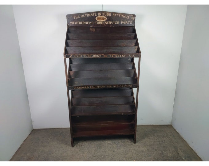 1930,s Weatherhead Metal Display Rack # 194663 Shipping is not a 1.00 Shipping is not free please contact us before purchase Thanks