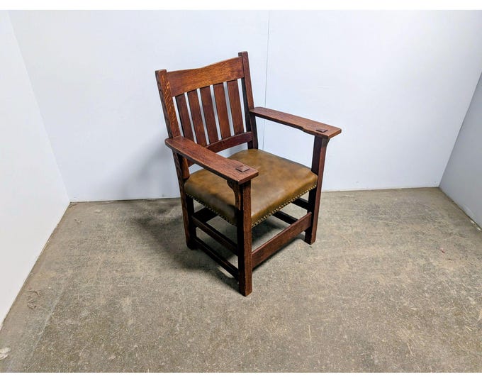 1920,s Stickley Mission Oak Arm Chair # 200753 Shipping is not a 1.00 Shipping is not free please contact us before purchase Thanks