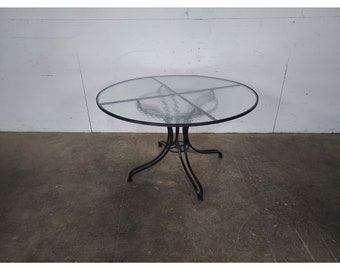 1950,s Round Iron And Glass Table # 194405 Shipping is not a 1.00 Shipping is not free please contact us before purchase Thanks