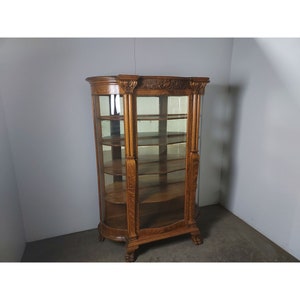 1920,s Oak Curved Glass Display Cabinet # 193956 Shipping is not a 1.00 Shipping is not free please contact us before purchase Thanks