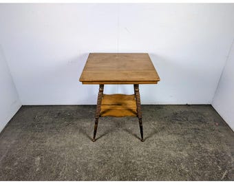 1920,s Two Tier Oak Parlor Table # 197850 Shipping is not a 1.00 Shipping is not free please contact us before purchase Thanks