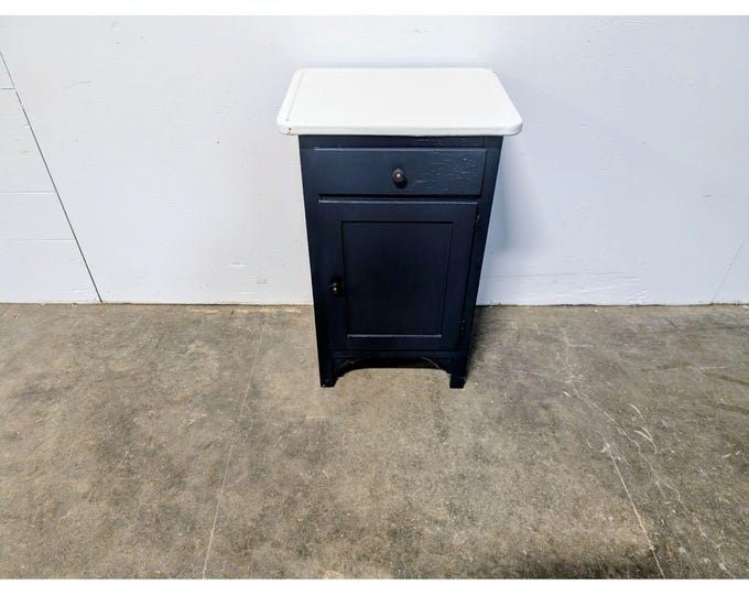 1930,S ENAMEL TOP CABINET # 199644 Shipping is not a 1.00 Shipping is not free please contact us before purchase Thanks