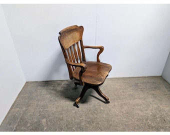 1920,S OAK DESK CHAIR # 199928 Shipping is not a 1.00 Shipping is not free please contact us before purchase Thanks