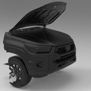 May include: A matte black pickup truck with the hood open, revealing the engine compartment. The front tire is visible, and the vehicle is set against a neutral gray background. The truck's design features a prominent grille and headlights.