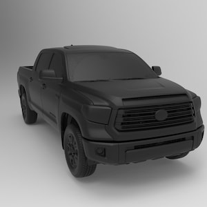May include: A matte black pickup truck with a crew cab. The truck has a large front grille, black wheels, and a sunroof. The vehicle is shown from a high angle, with a neutral background.