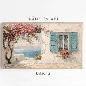 May include: Framed artwork depicting a Mediterranean scene. A white stucco building with turquoise shutters and a window is visible. Pink bougainvillea cascades over a pergola. The text "FRAME TV ART" and "blitzaria" are displayed.