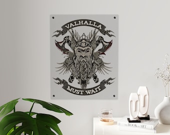 May include: A grey metal sign with a detailed illustration of a Viking warrior, axes, and wings. The text "VALHALLA" and "MUST WAIT" are displayed on banners above and below the warrior.