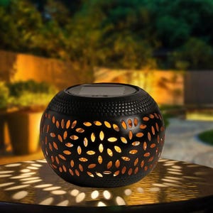 Solar Garden Lantern: Metal Elliptical Design with Shadow Projection