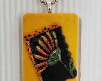 Original handpainted OOAK necklace pendant. Hand stamped   clay mounted on a painted wooden rectangle. Floral, wearable art. Handmade