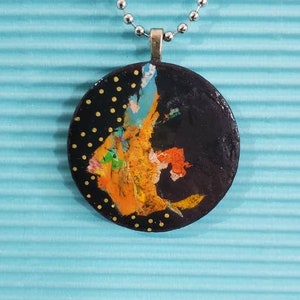 OOAK original handpainted pendant necklace.  Abstract. Black. Teal. Orange. Round. Hand painted.  Handmade. Wearable art.  Wooden disc.