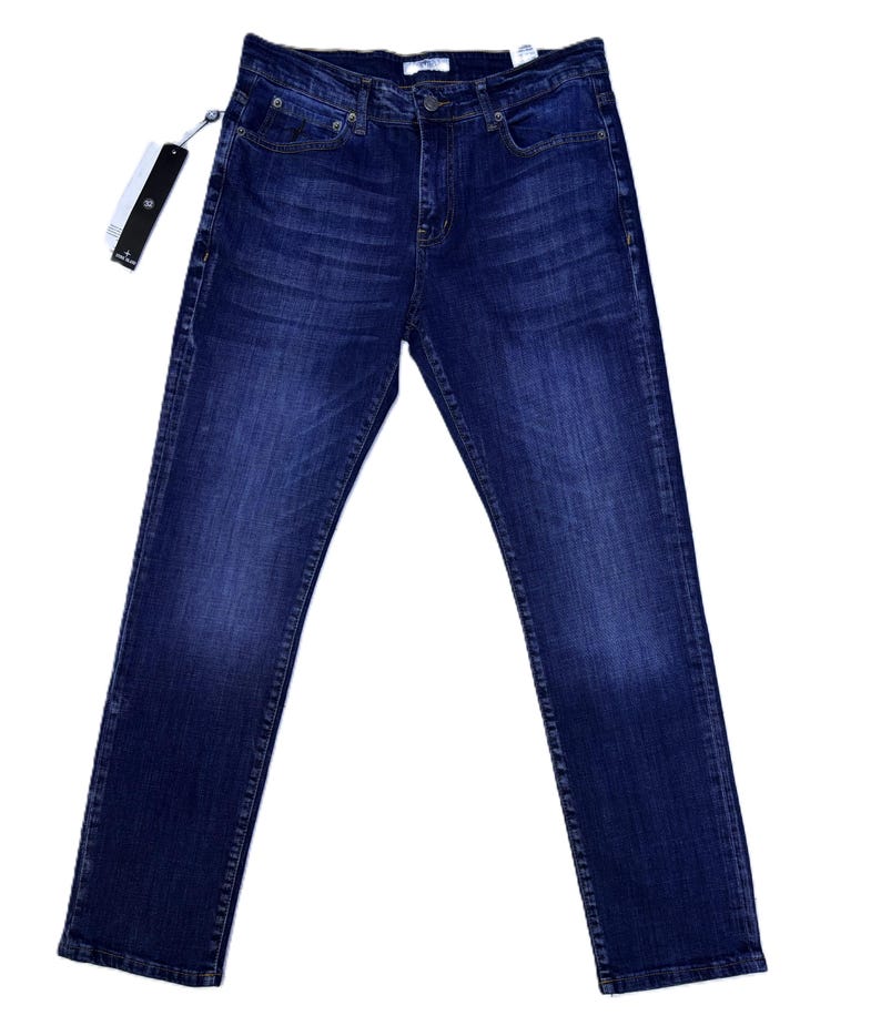 May include: Dark wash denim jeans with a classic five-pocket design. The jeans have a straight leg fit and a button and zipper closure. A brand tag is attached to the jeans.