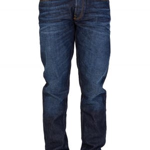 May include: Dark wash denim jeans with a classic five-pocket design. The jeans have a straight leg fit and feature copper-colored stitching and rivets. The denim has a slight fade, giving it a worn-in look. The jeans are a versatile wardrobe staple.