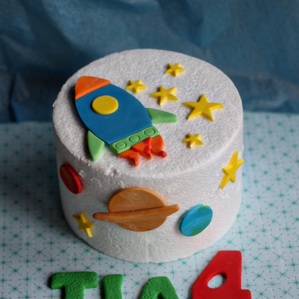 Fondant Rocket, Stars and Planet Cake Decorations for a Space Party Birthday Cake