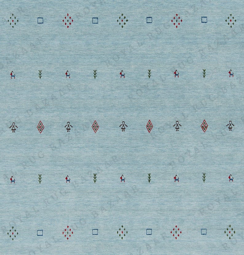May include: A light blue rug with a repeating pattern of small geometric shapes and stylized figures in red, green, and black. The rug has a textured appearance.