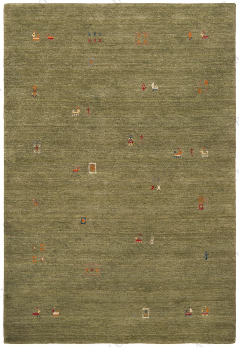 May include: A rectangular olive green rug with a textured surface. The rug features scattered, colorful, geometric designs and small, stylized figures in red, orange, blue, and white.