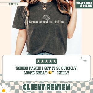May include: Pepper-colored t-shirt with the text "ferment around and find out" in white. The shirt features a simple illustration above the text. The image also includes a customer review.