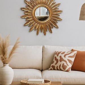 Panel de pared con marco de espejo de madera con efecto rayos de sol y espejo
