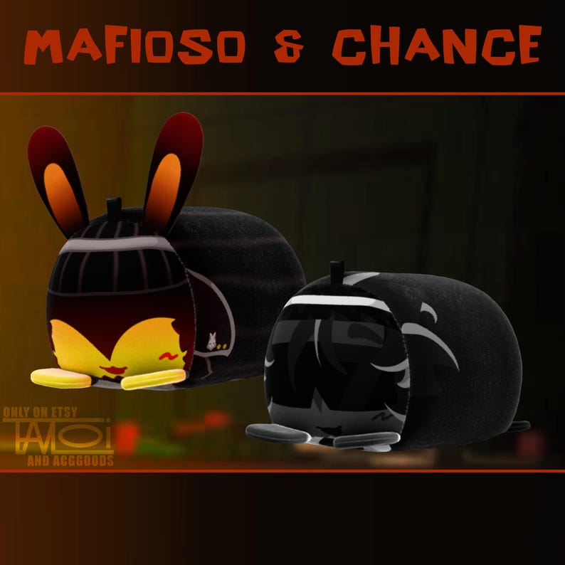 Pode incluir: Brinquedos de pel&uacute;cia com um design de coelho de desenho animado. Um brinquedo &eacute; preto e marrom com orelhas laranja e detalhes amarelos. O outro brinquedo &eacute; preto e branco. O texto "MAFIOSO & CHANCE" est&aacute; no topo.