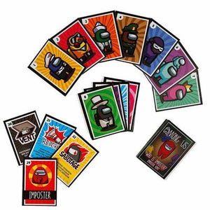 May include: A collection of Among Us game cards, featuring various crewmate characters in different colors and outfits. The cards are arranged in an arc, with additional cards scattered below. The cards have text such as "Imposter", "Sabotage", and "Vent".