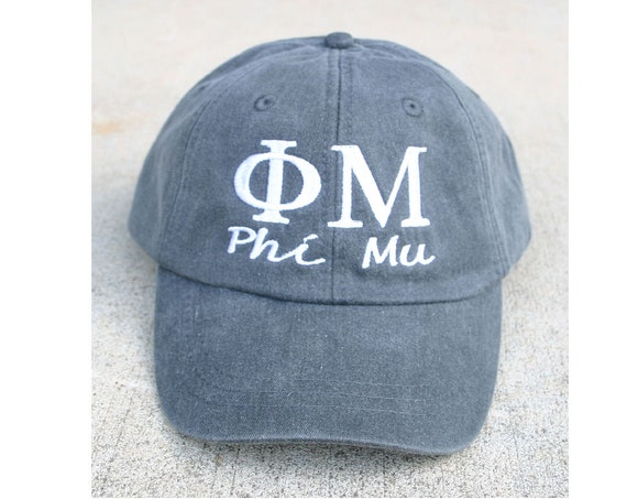 Phi Mu script with BIG and LITTLE added to the back of baseball cap