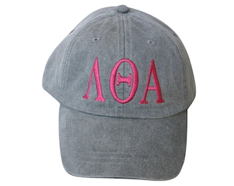Lambda Theta Alpha baseball cap with embroidered greek letters