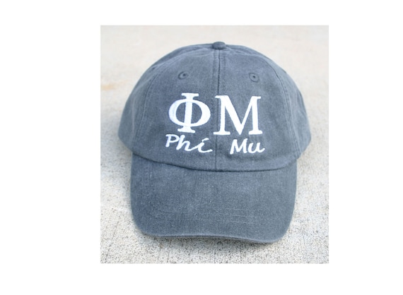 Phi Mu script with BIG and LITTLE added to the back of baseball cap