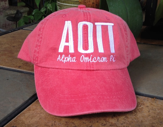 Alpha Omicron Pi script with BIG and LITTLE added to the back of baseball cap