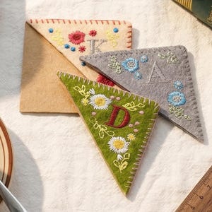 May include: A rustic wooden sign with the text "Welcome to our home" in white lettering. The sign has a distressed finish and a simple, inviting design, ideal for entryway decor.