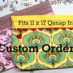 May include: Two fabric bags, one pink with floral print and one yellow with a teal and red patterned design. The yellow bag has the text "Fits 11 x 17 Qsnap frame" and "***Custom Order***".
