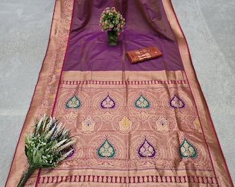 Stofroze zachte zijden sari: Indiase ontwerper Zari Weaving