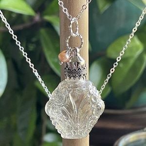 Elegant Vintage Glass Perfume Bottle Necklace with Silver Accents