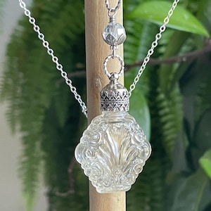 Elegant Vintage Glass Perfume Bottle Necklace with Silver Accents